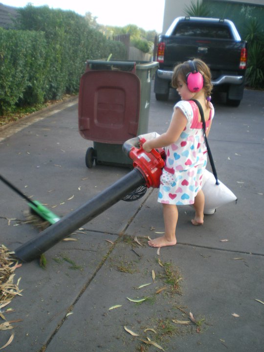 leaf blowing with kids ear muffs
