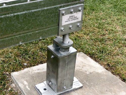 Ezi Pier system using steel subframe and steel posts bolted with base plates into concrete pad