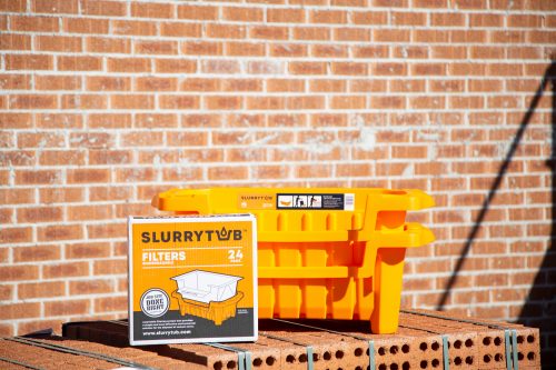 Slurrytub Trade Kit sitting on brick pile